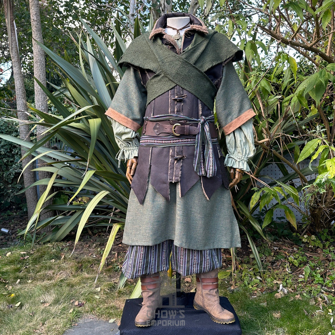 Medieval LARP costume with brown boots, striped trousers.