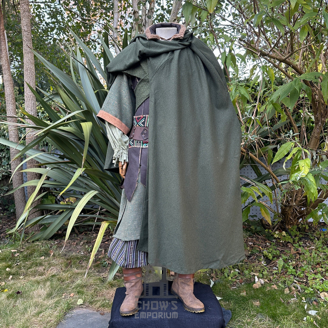 Medieval LARP outfit with green cloak, waistcoat, hood, side view.