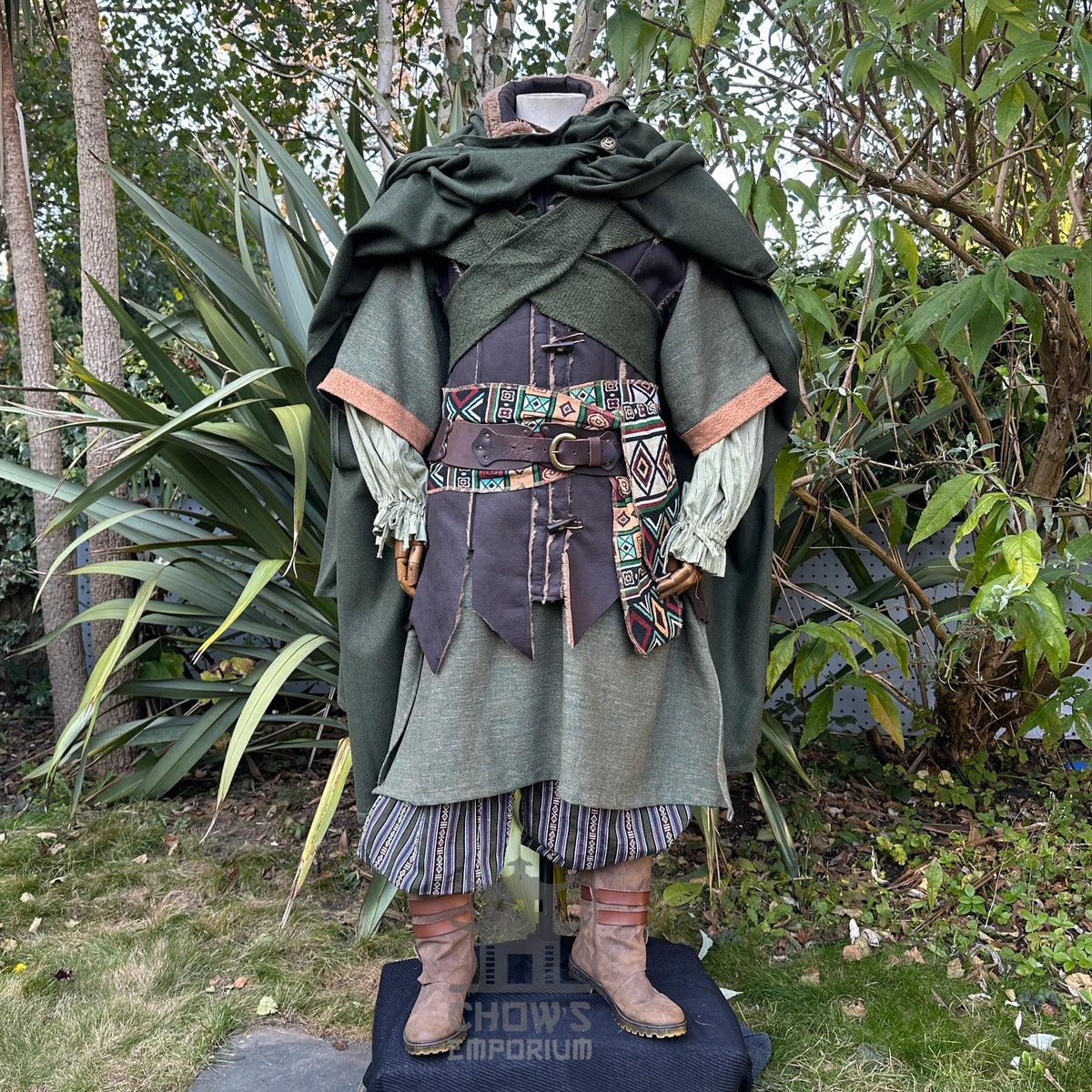 Forest LARP costume with patterned belt, layered cloak.