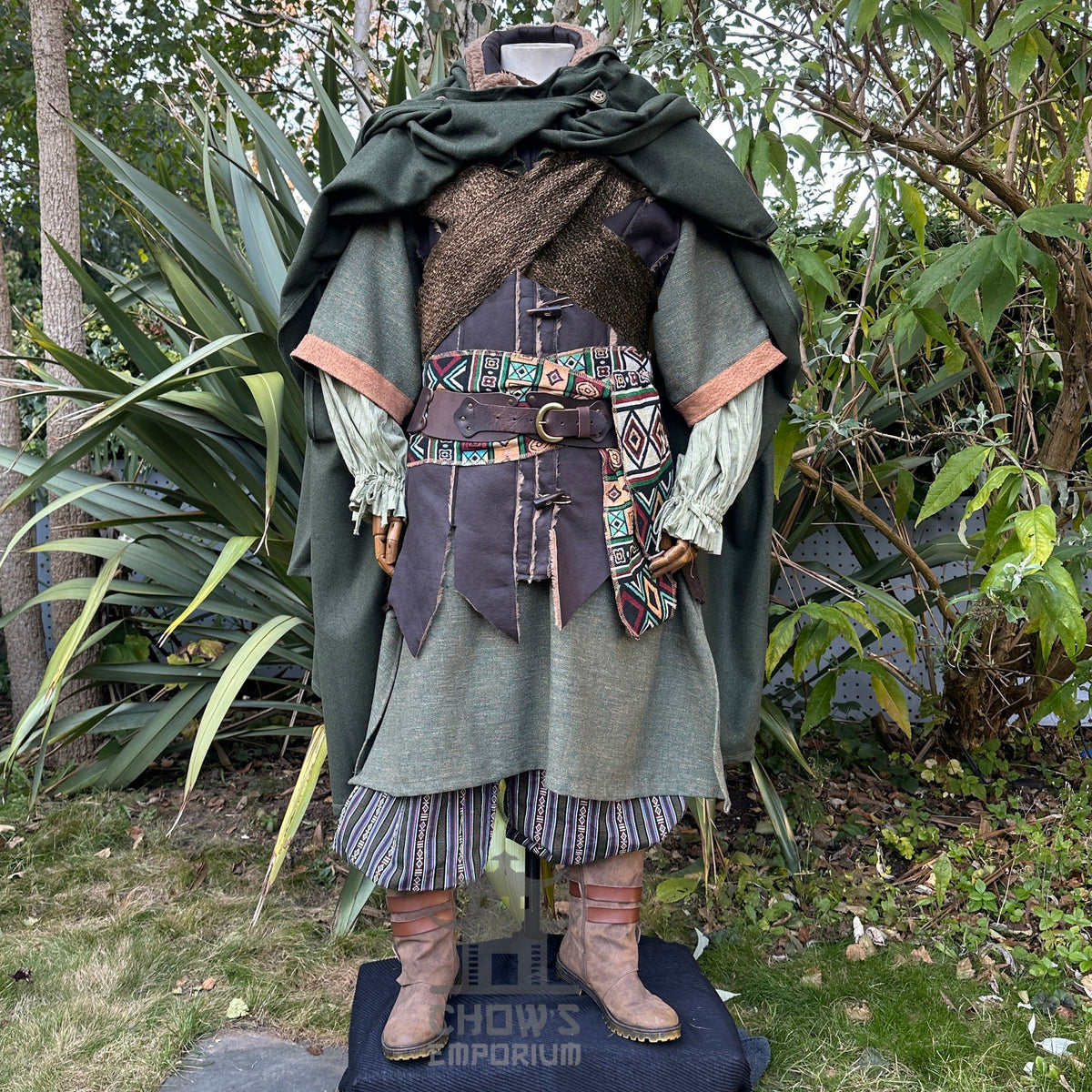 Medieval LARP outfit front view, featuring a green cloak, waistcoat, hood, shirt, trousers, belt.
