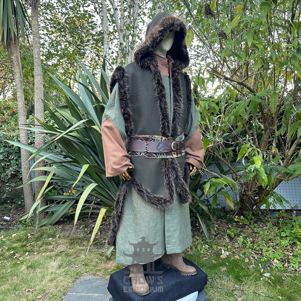 LARP medieval outfit front view, detailed fur trim hooded cape, colourful belt.