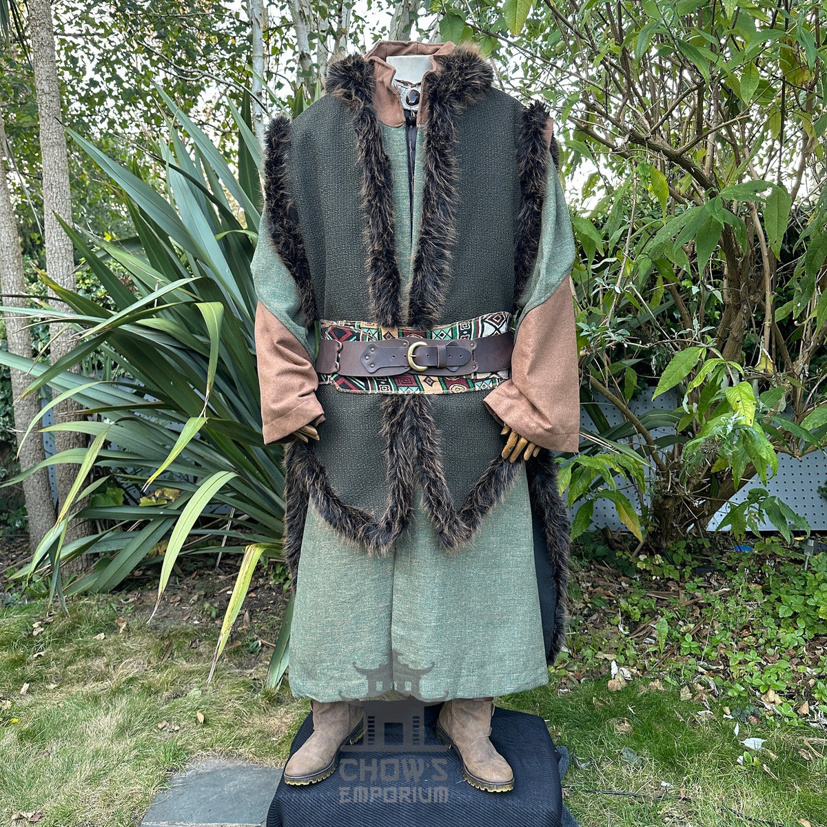 LARP forest warlock outfit with fur trim and patterned belt.