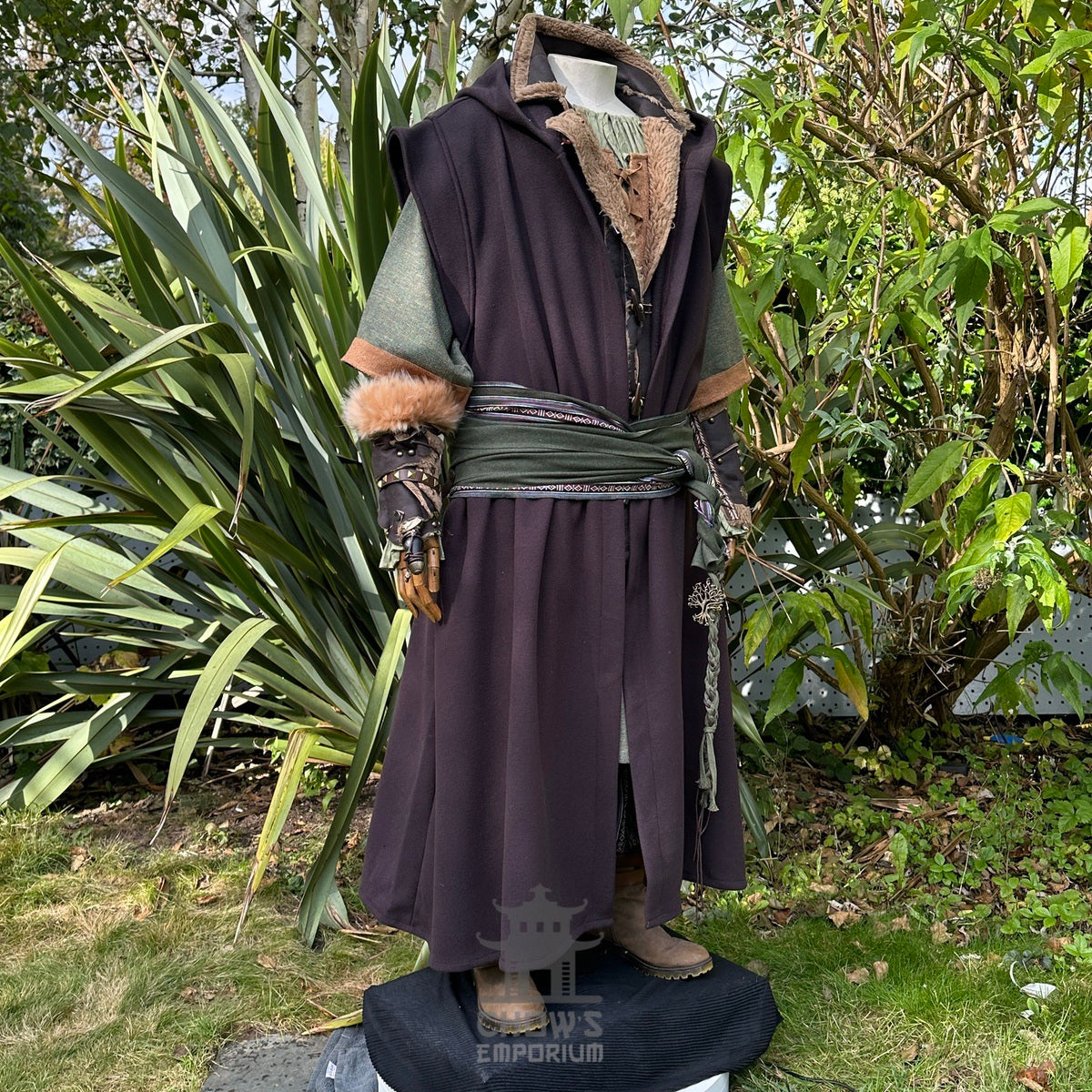 Angled front view of sleeveless brown medieval LARP robe, fantasy cosplay costume with hood and.