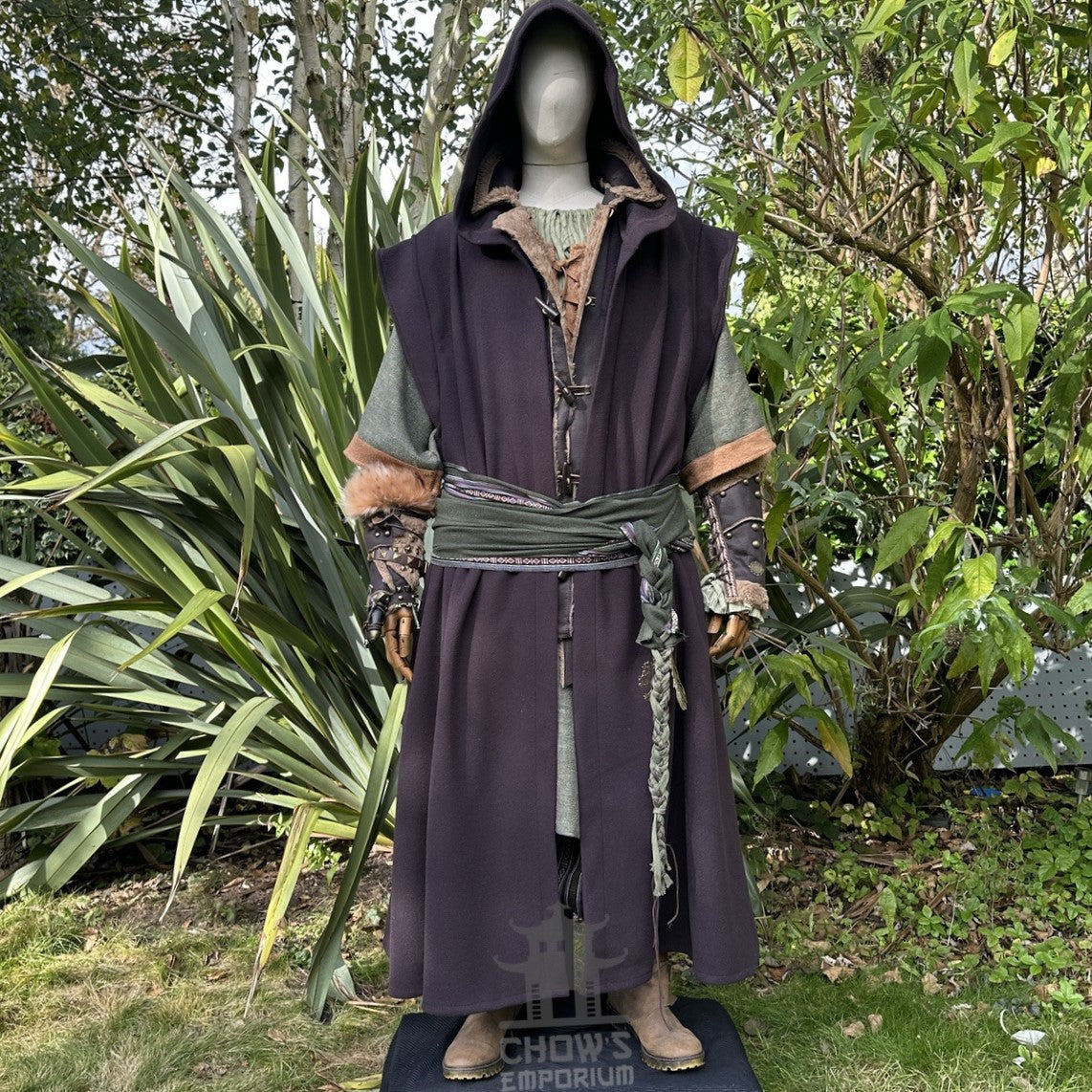 Forest LARP outfit with green tunic, brown robe, vambraces, and sash.