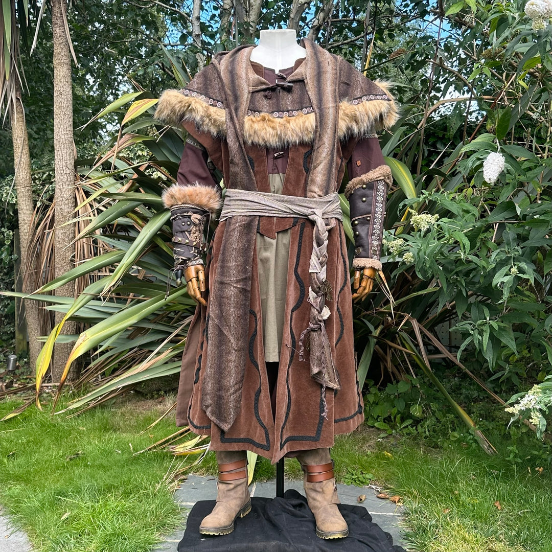 LARP waistcoat front view with fur trim and ornate braiding, woodland setting.
