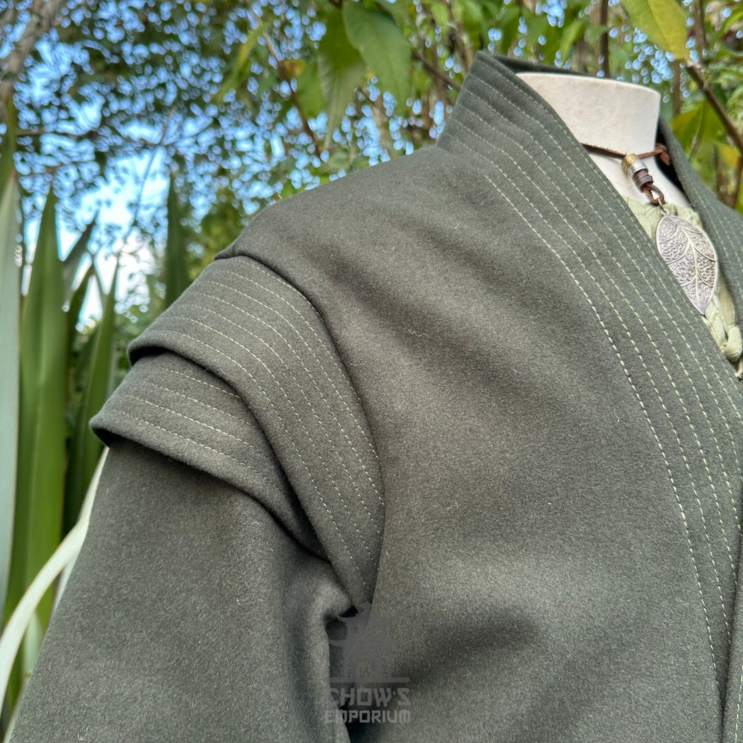 Green medieval LARP robe showing collar and neckline detail, fantasy cosplay costume for rangers.