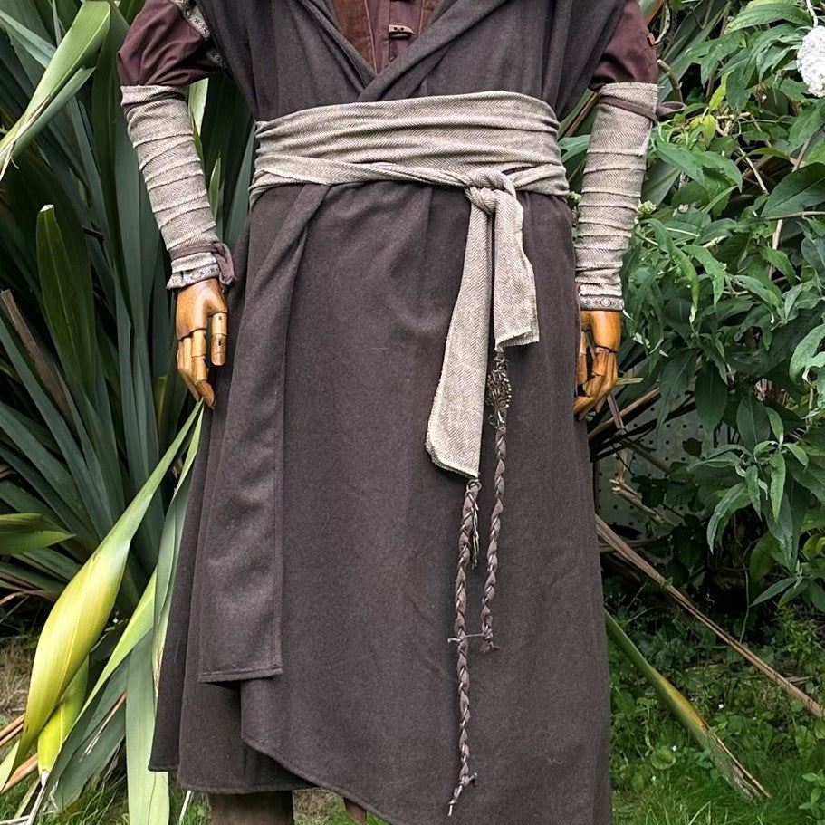 Brown LARP costume waistcoat with detailed sash and vambraces attire.