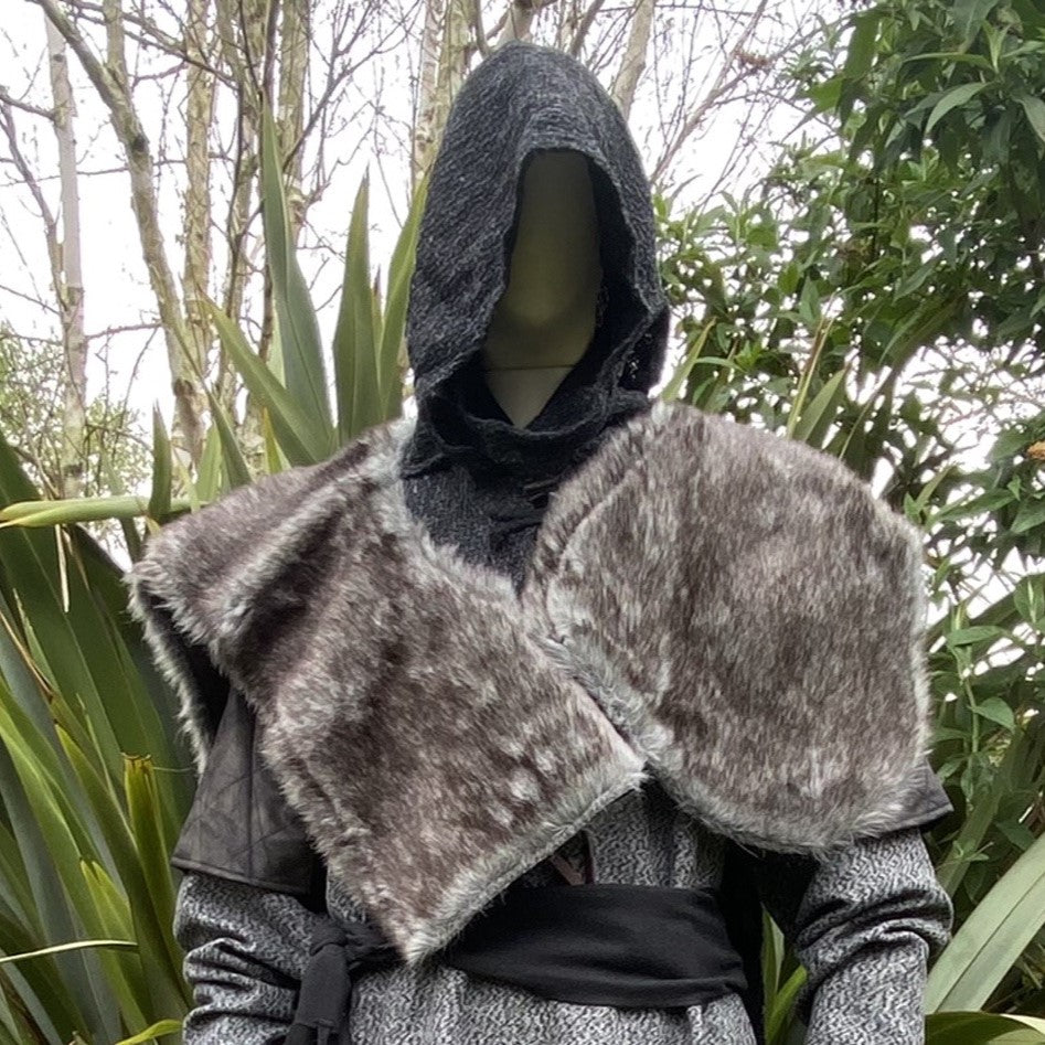 Medieval LARP outfit front view, featuring a grey wrap-around hood, and grey faux-fur mantle.