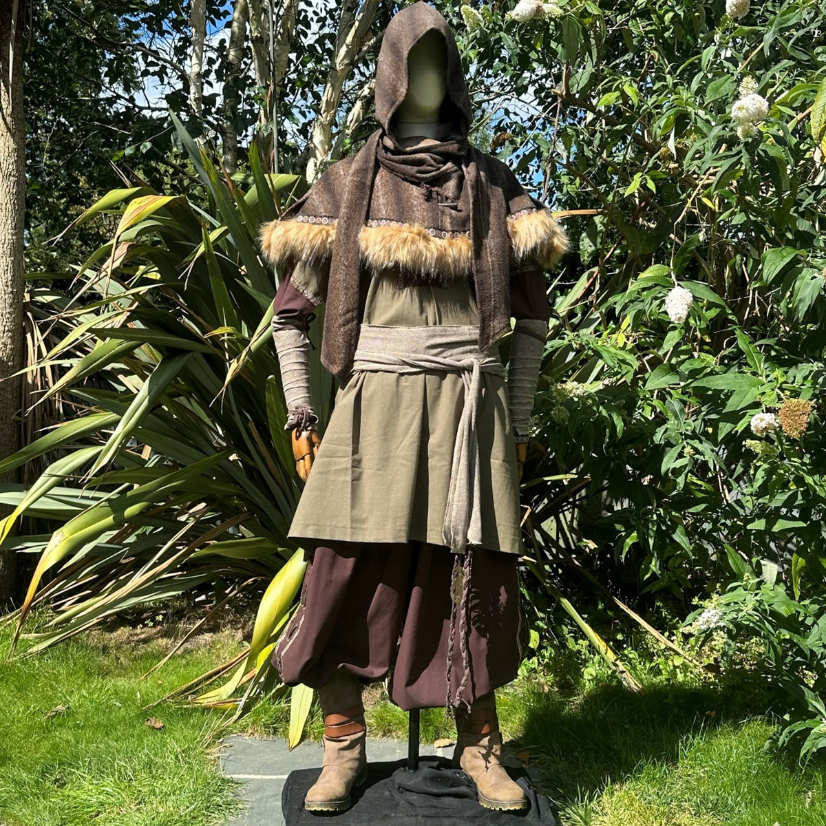 Hooded medieval LARP outfit with fur trim, brown and olive tones.