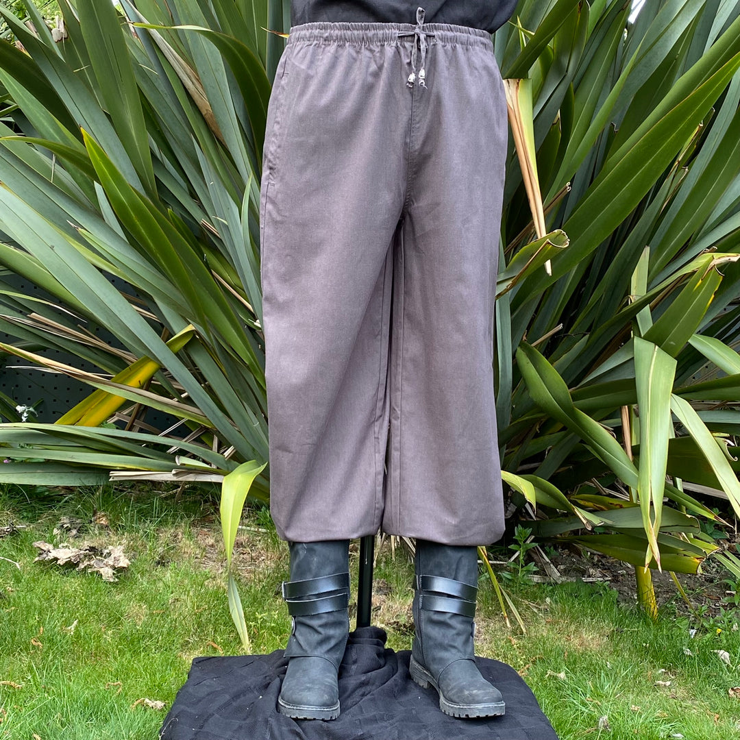 Front view of grey cotton straight-leg medieval trousers with adjustable waist for LARP wear.