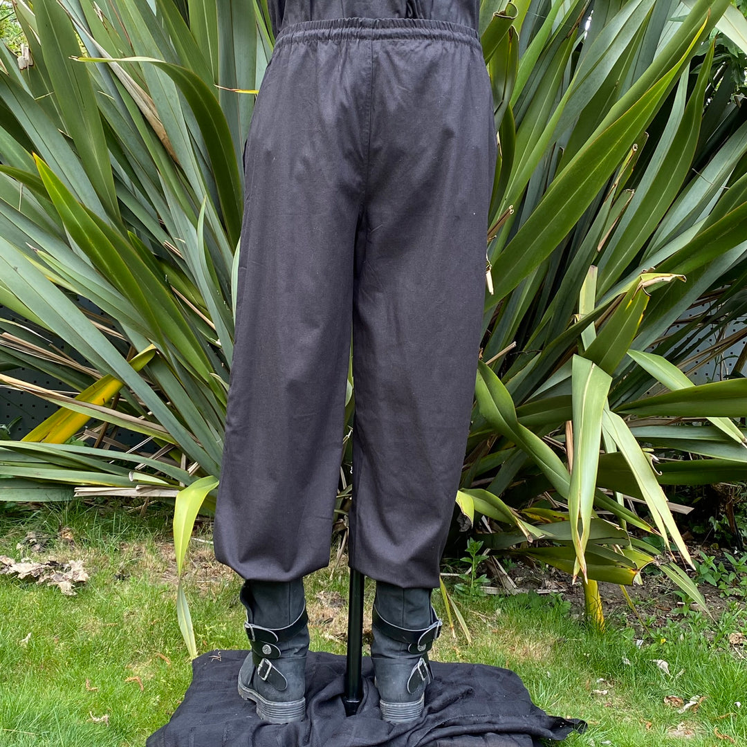 handmade black cotton roleplay pants with straight cut.