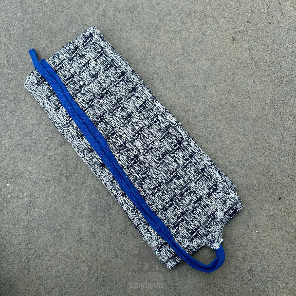 Blue and white knitted wool leg wraps, perfect for medieval LARP events.