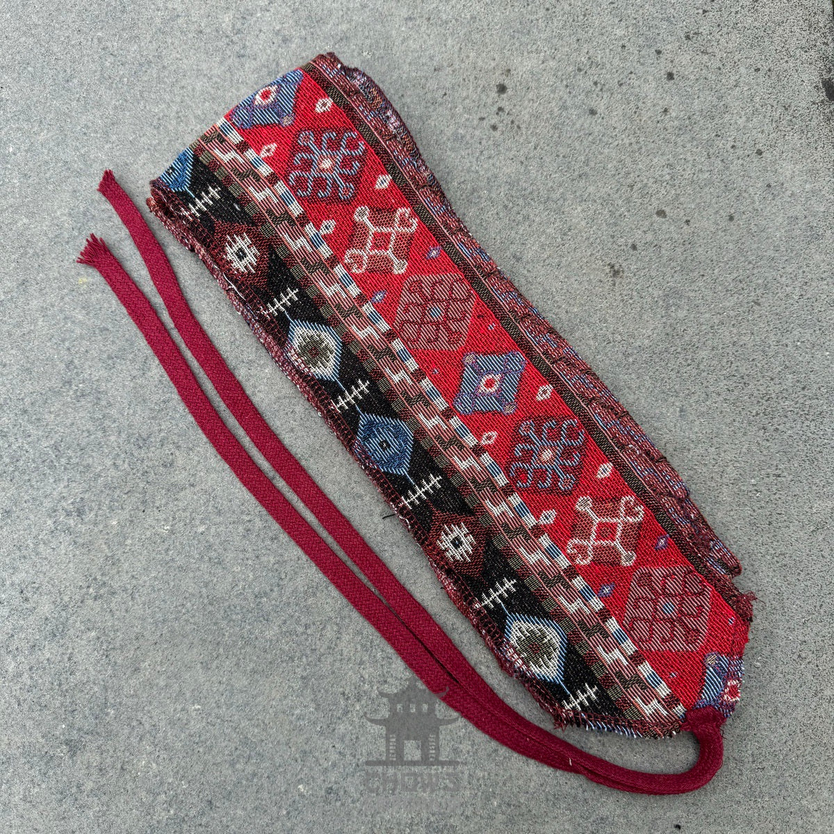 Red Aztec pattern LARP belt and sash set, buffalo leather, top view.
