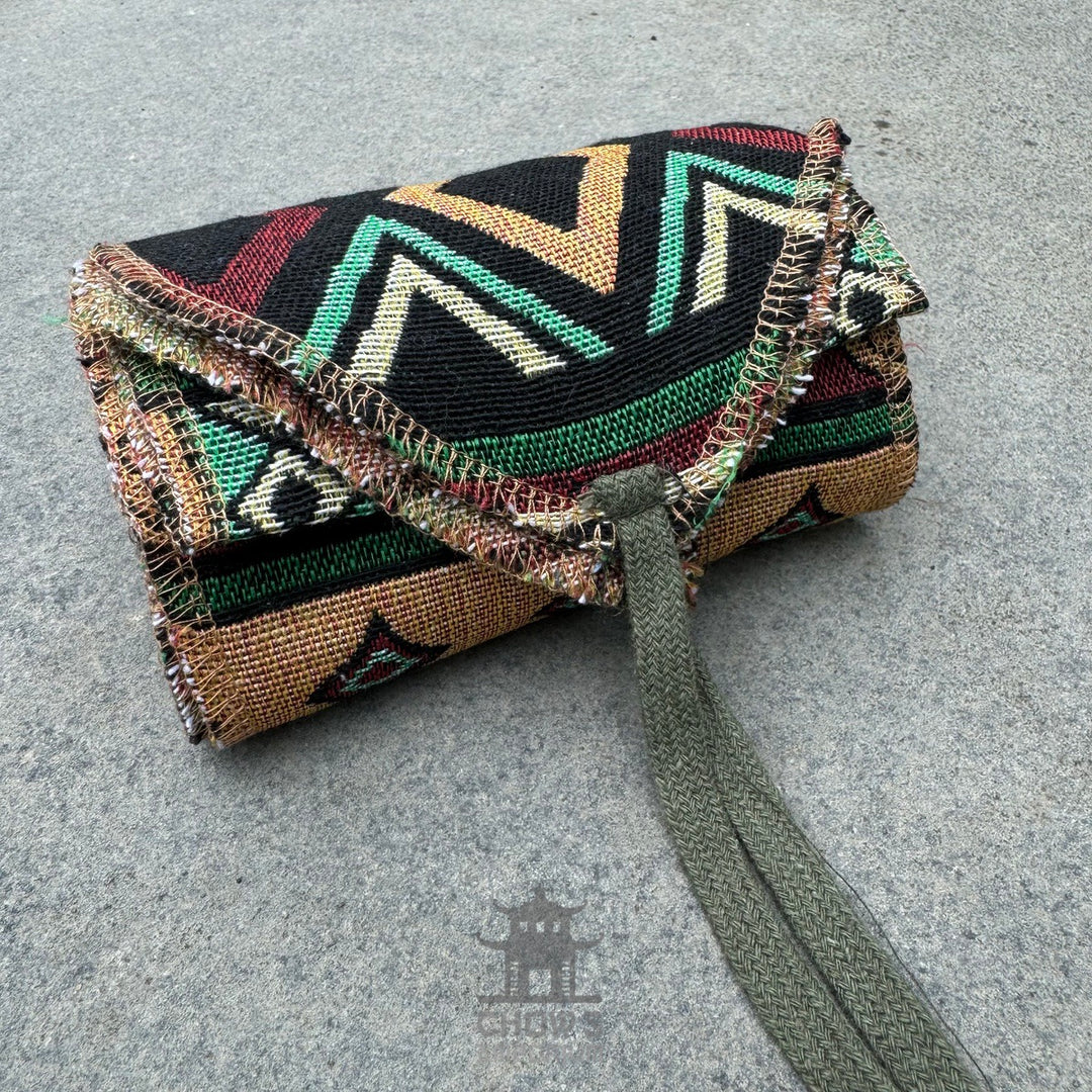Green Aztec pattern LARP belt and sash, buffalo leather, rolled view.