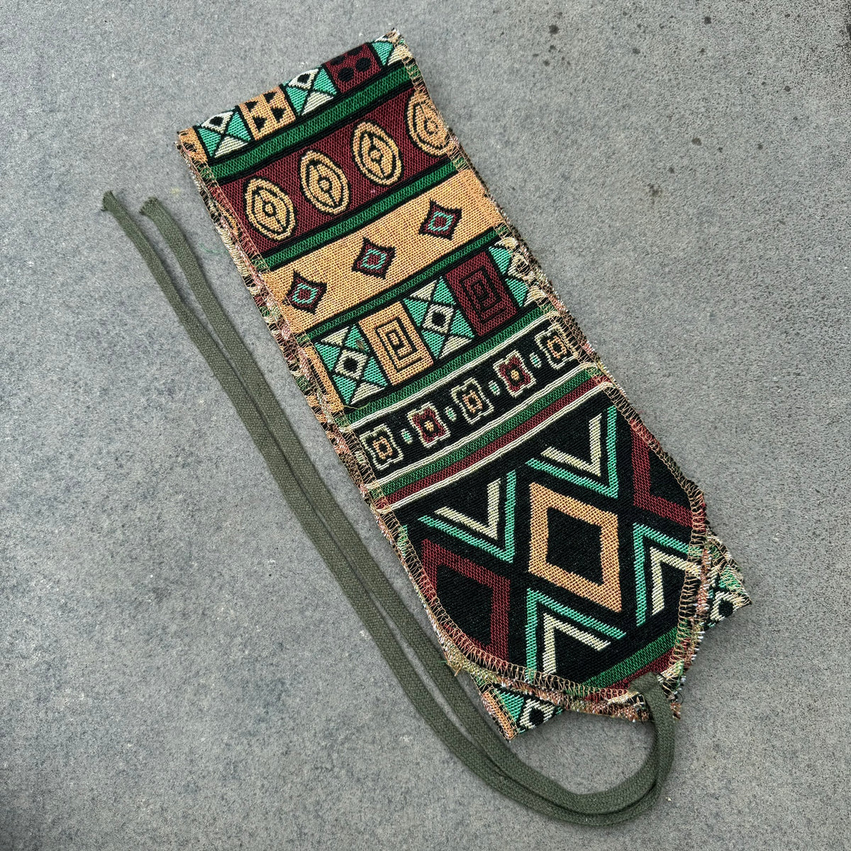Green Aztec pattern cotton leg wraps for LARP.