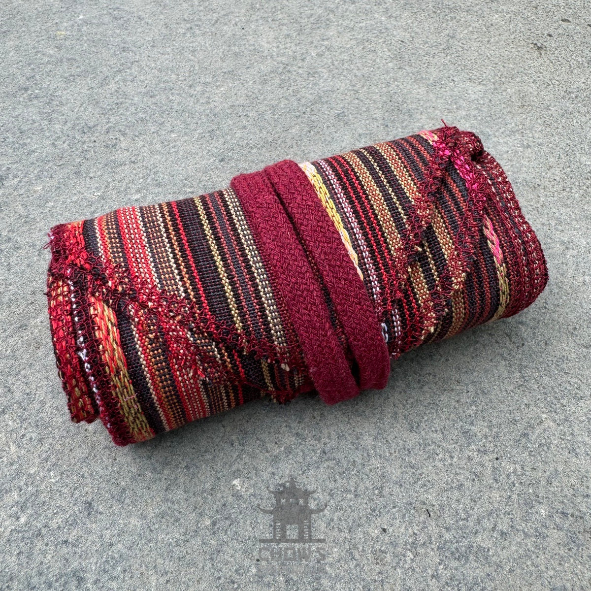 Red and autumnal striped sash and belt set for LARP costumes.