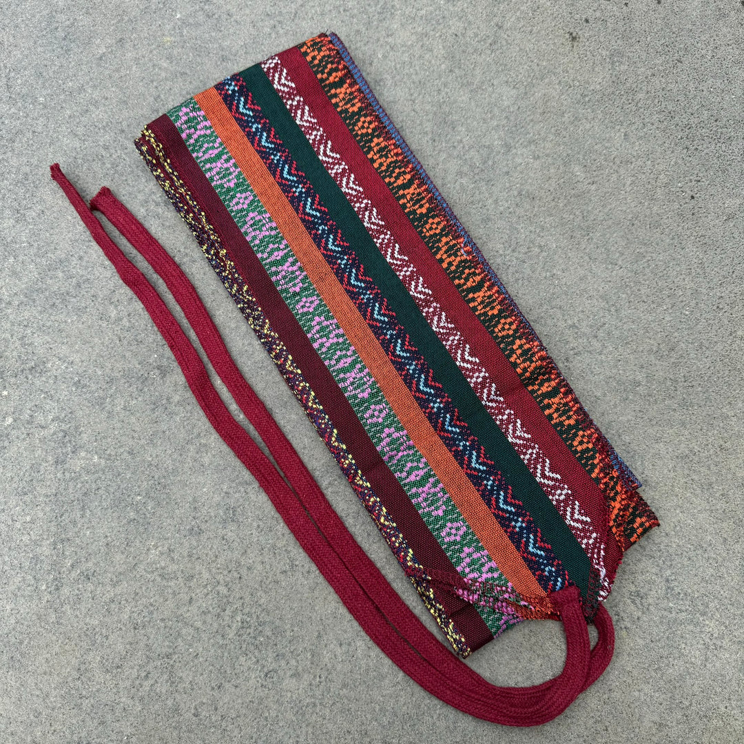 Multi-patterned cotton leg wraps for LARP, colorful stripes, side view.
