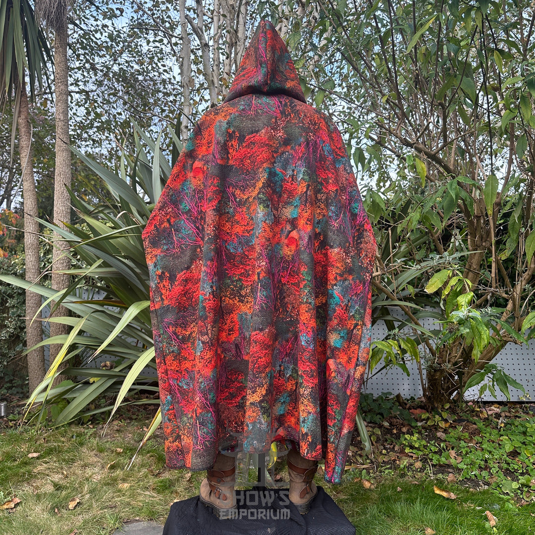 Autumn druid LARP cloak in vibrant red and green, back view.