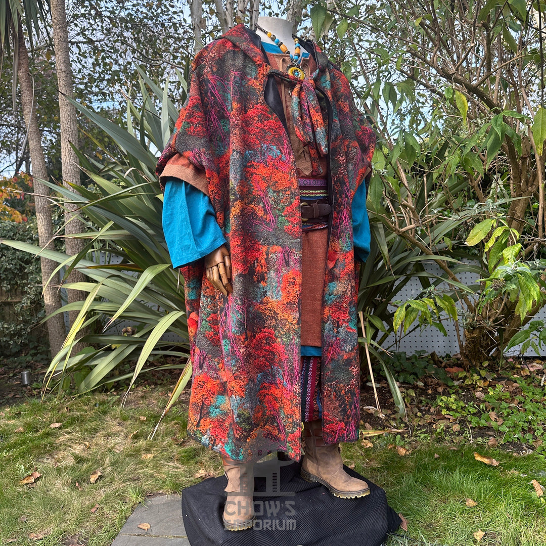 Side view with arms out of Autumn Druid Cloak with faux fur trim, fantasy medieval cosplay.