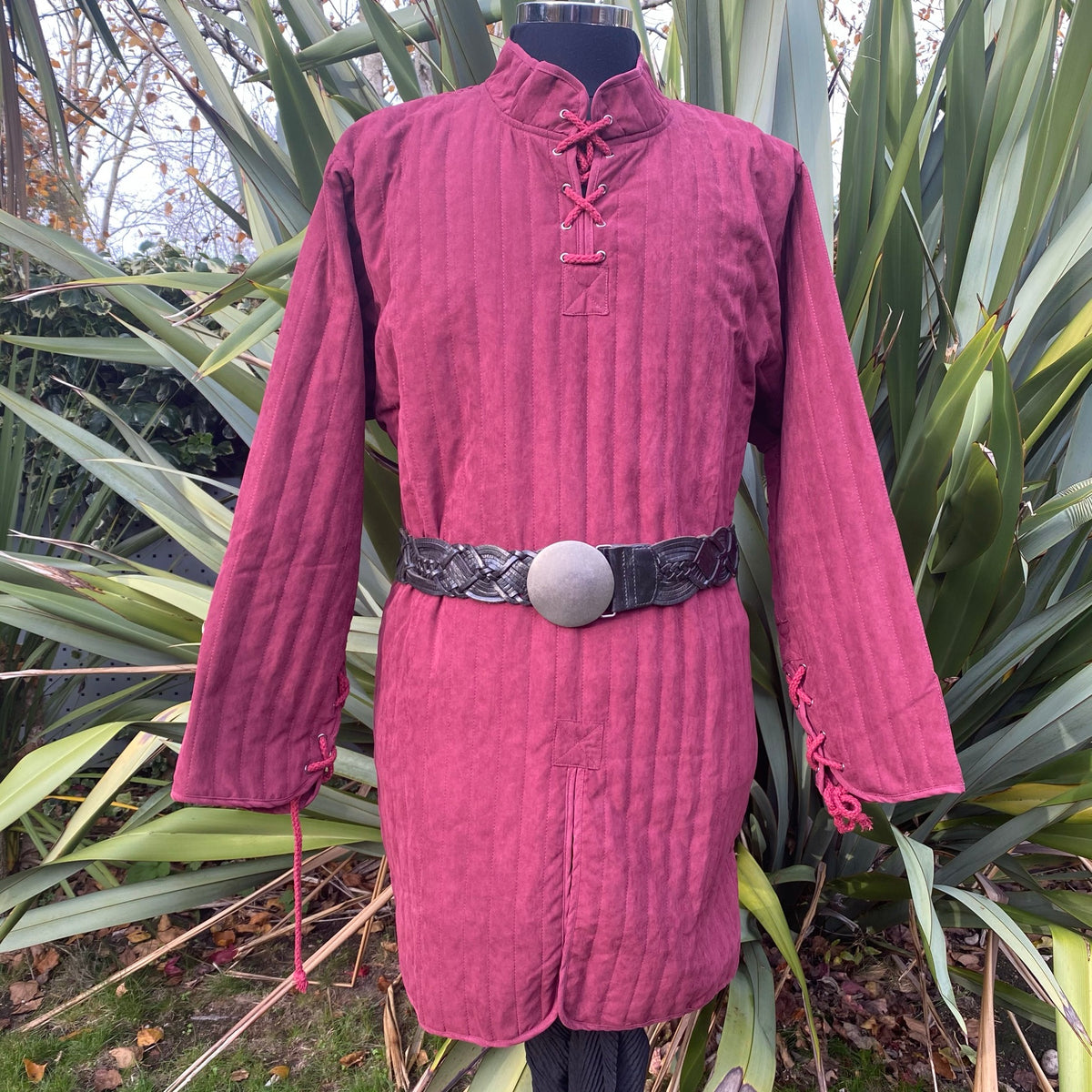 Maroon gambeson for LARP, front view, quilted fabric, black belt detail.