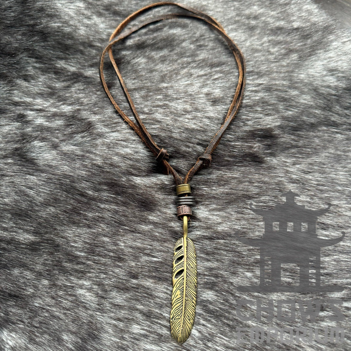 Brown leather necklace with bronze feather pendant for LARP.