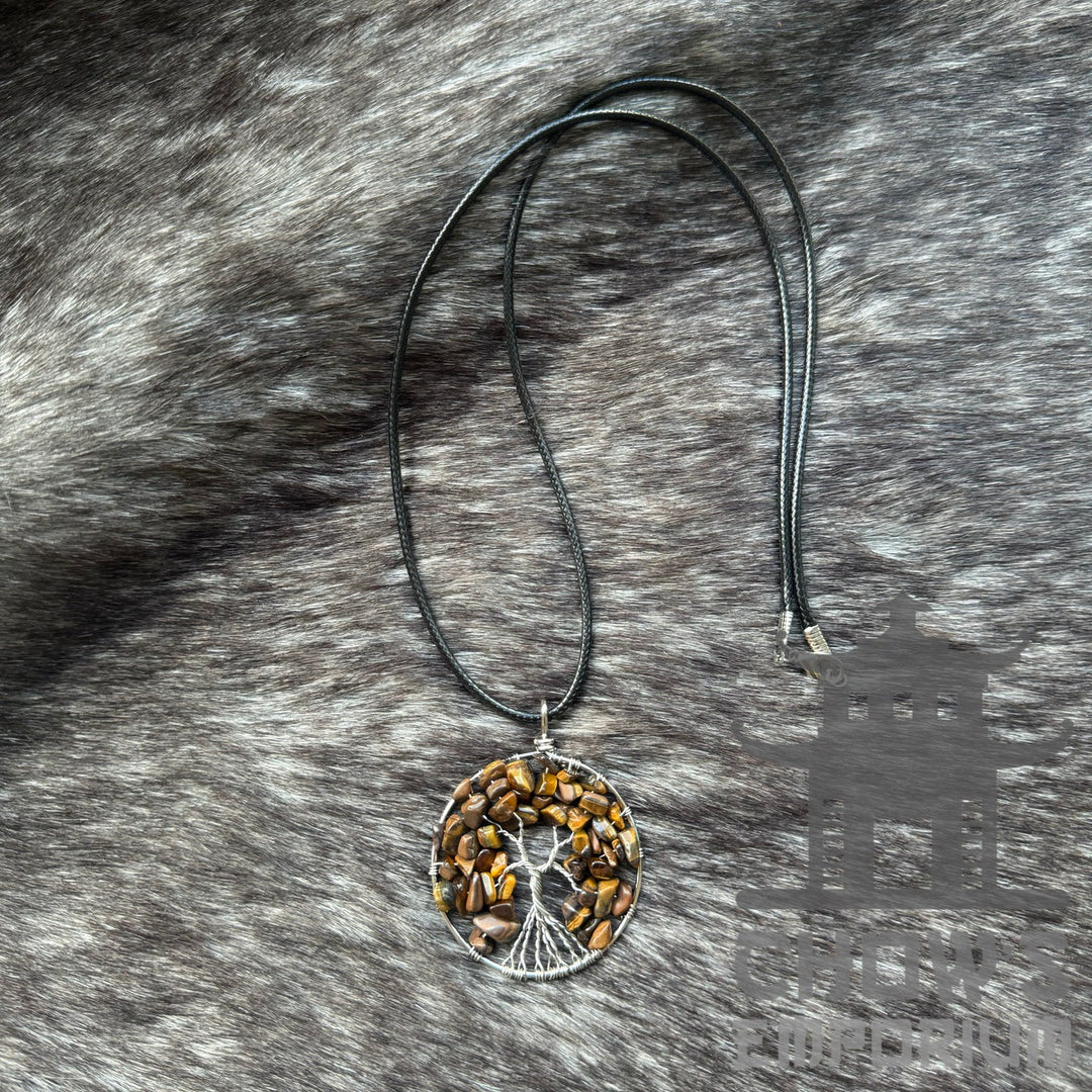 Necklace with tree pendant on fur. Earthy tones, medieval LARP accessory.