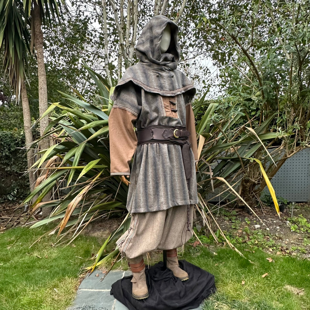 Medieval LARP snood hood drapes over mannequin amid.