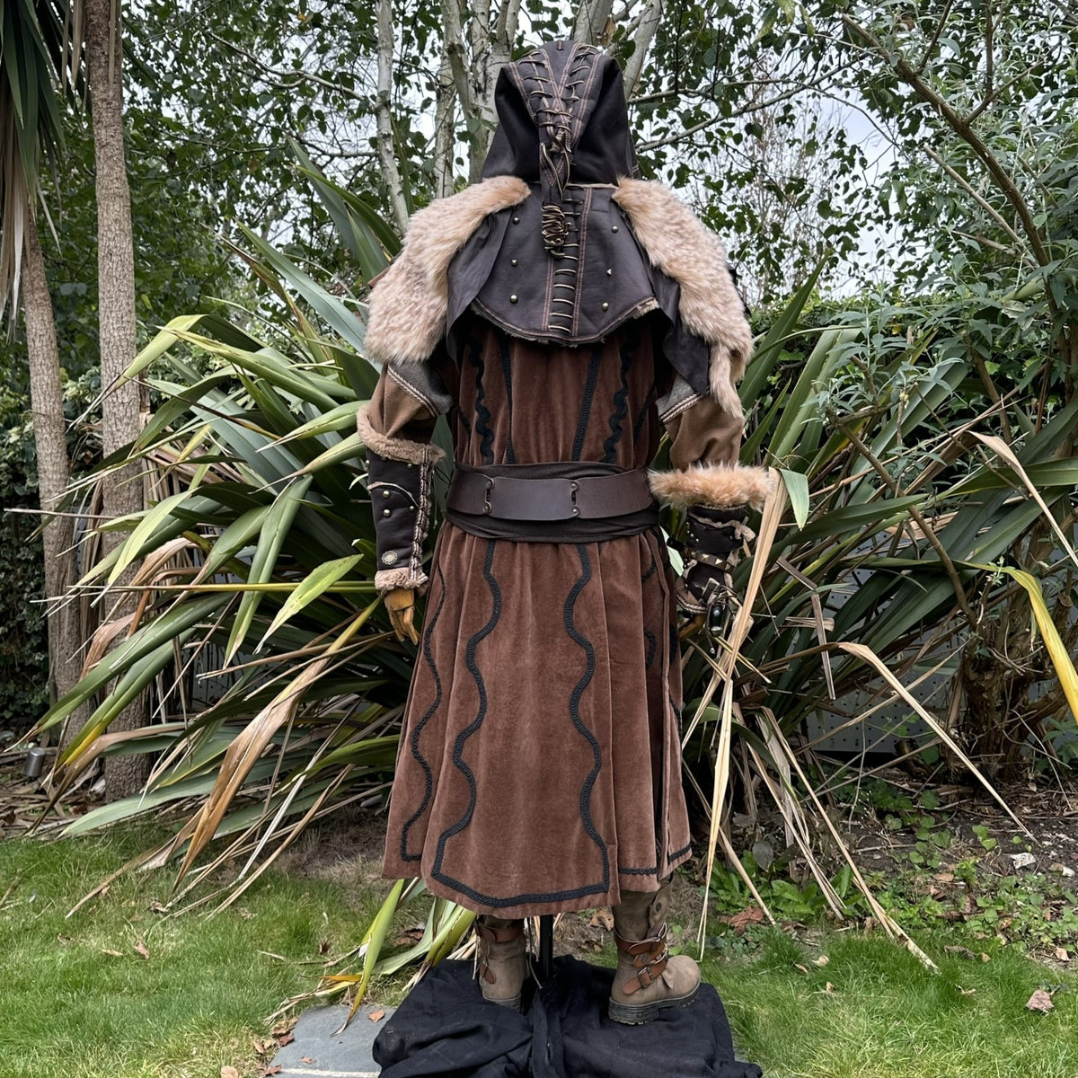 Rear view of LARP woodland outfit with ornate hood and fur trim.