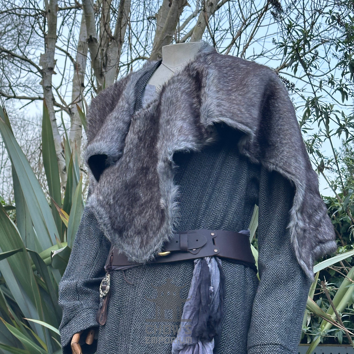 Grey fur shoulder cape for medieval LARP, seen from the front.