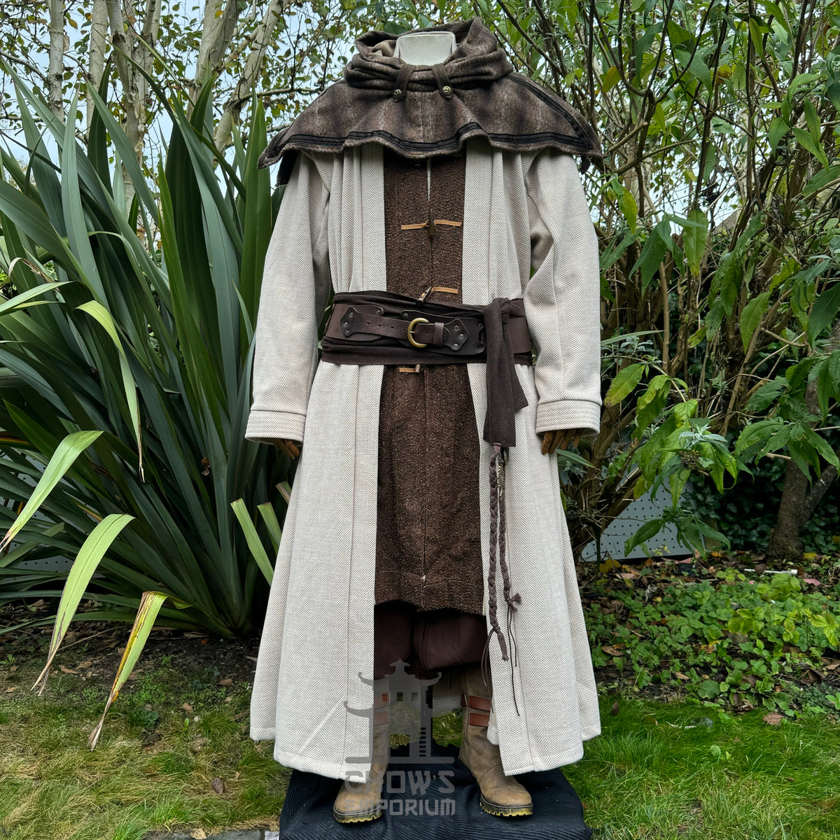Medieval LARP wizard set with layered robe in garden setting, front view.