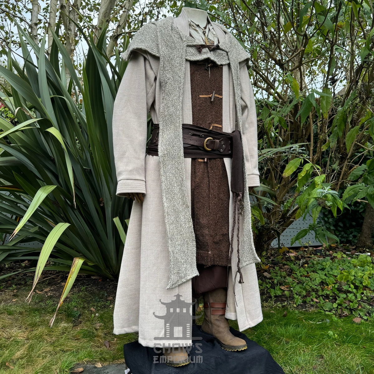 Oatmeal wool scarf hood draped over medieval costume.