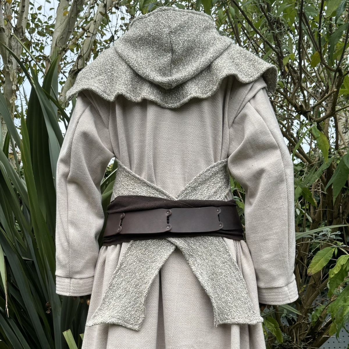 Back view of oatmeal wool scarf hood on medieval costume.