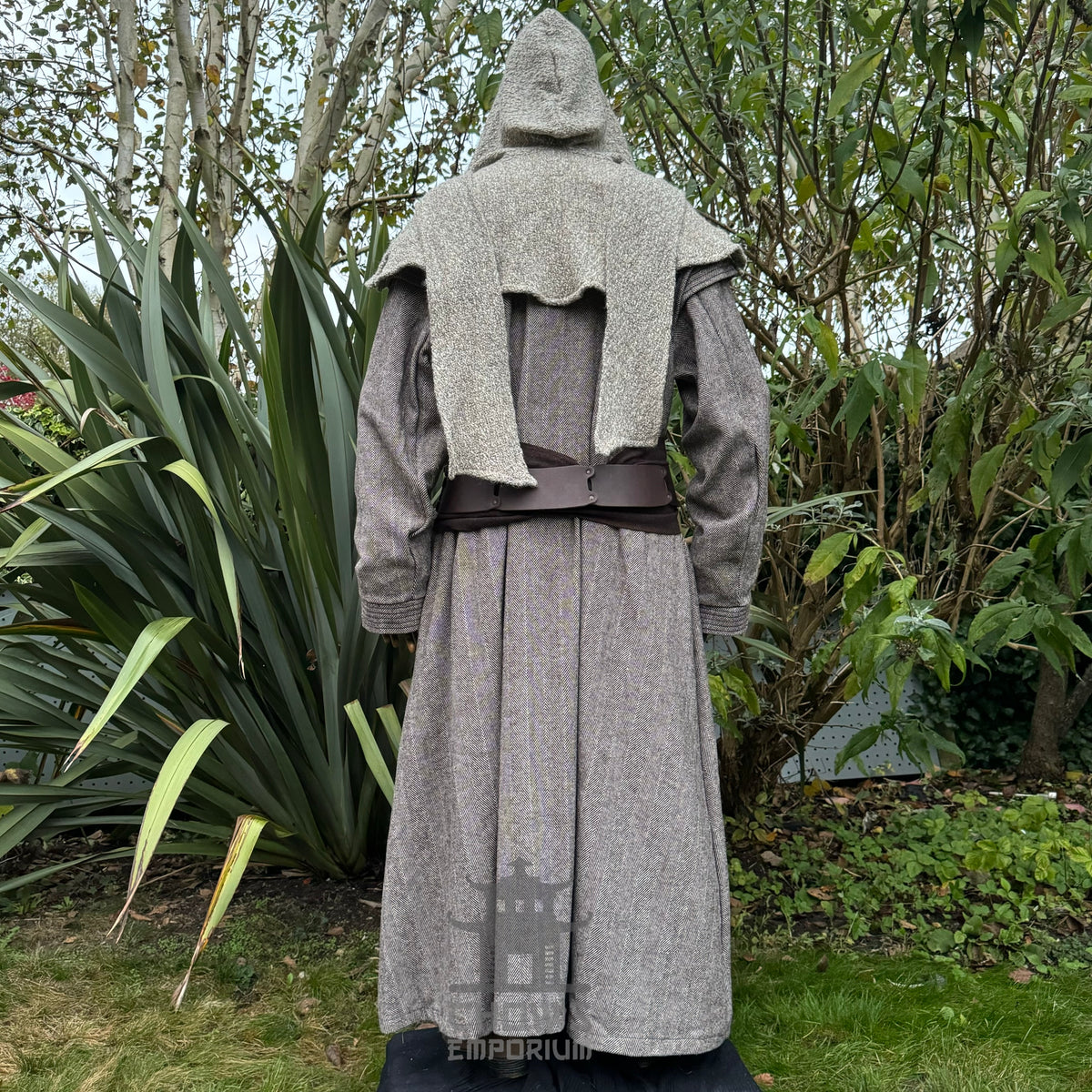 Rear view of medieval LARP robe with hood and textured shoulder detail.