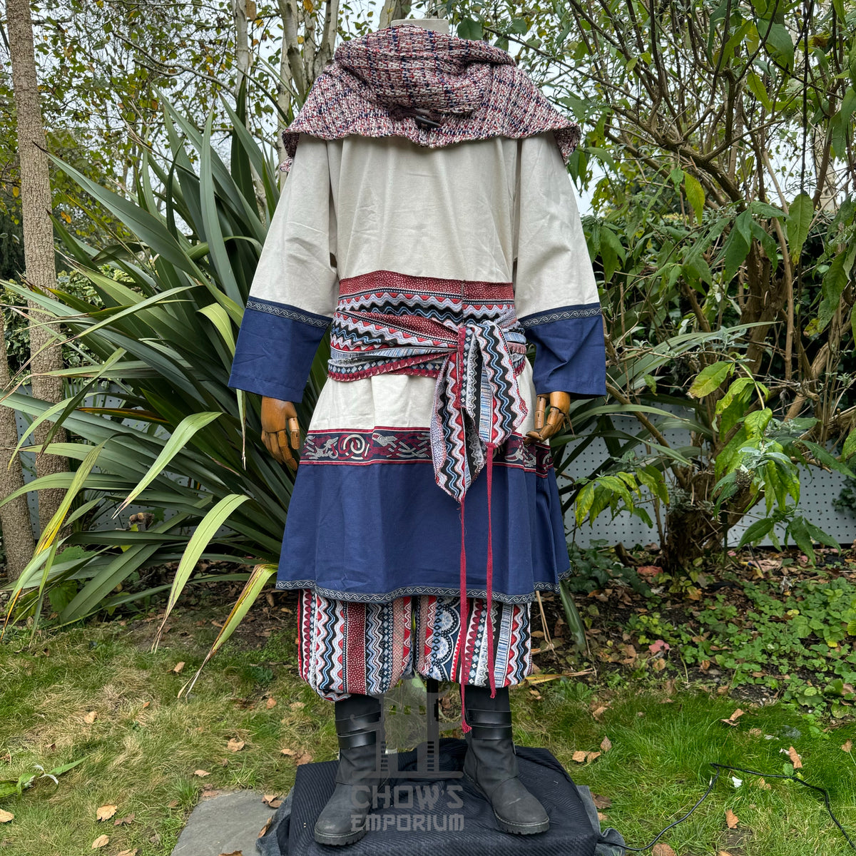 Medieval LARP archer set with white and blue tunic, sash, patterned hood.
