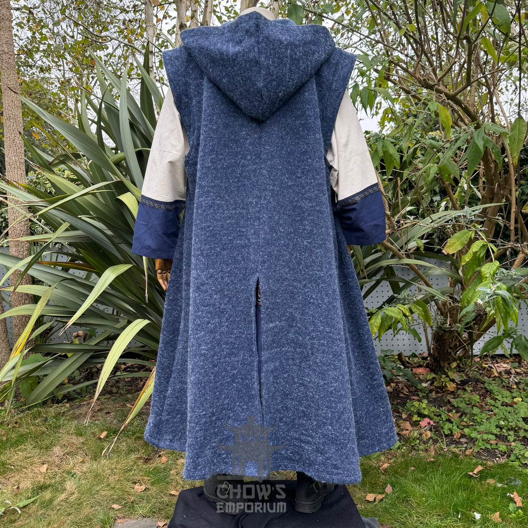 Blue hooded sleeveless robe in medieval style, rear view, textured fabric.
