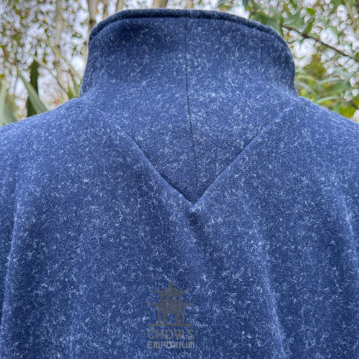 Back view of blue wool waistcoat with raised collar for LARP medieval costume.