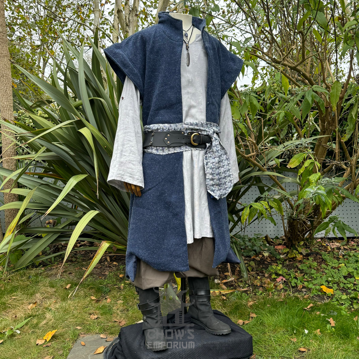 Mannequin in blue wool elven waistcoat with belt.
