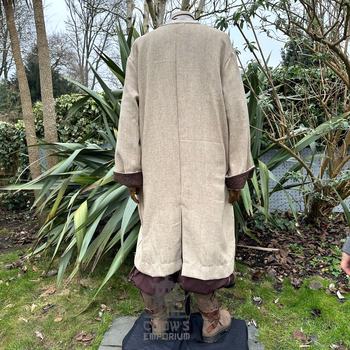Rear view of medieval LARP cloak with brown cuffs.