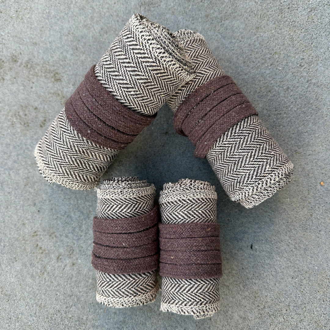 Light brown herringbone wool leg and arm wraps for medieval LARP.