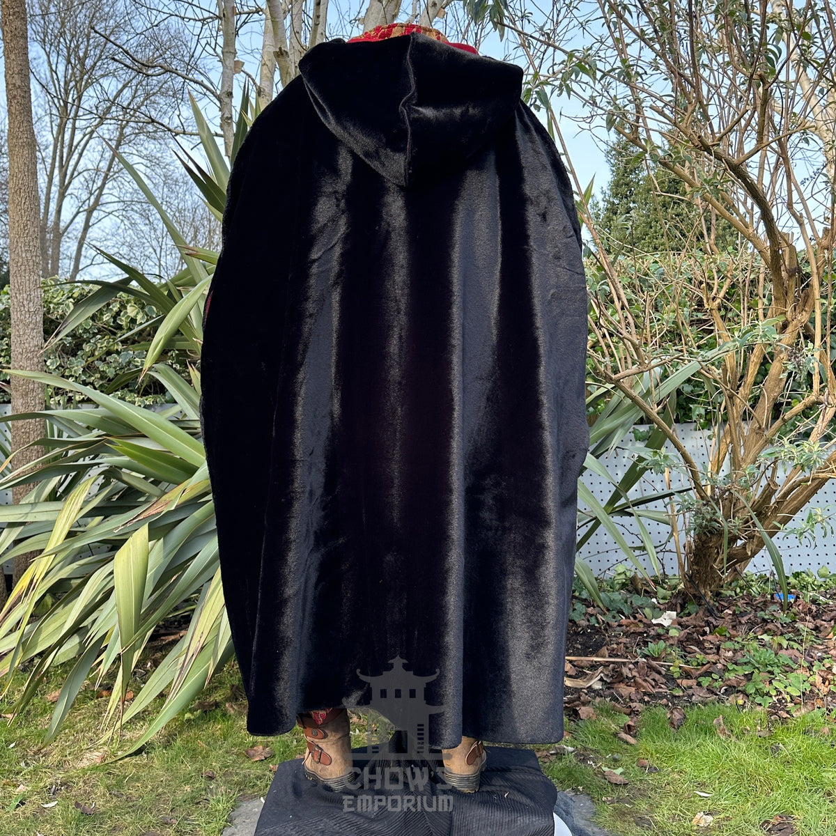 Back view of black velvet medieval LARP cloak with hood.