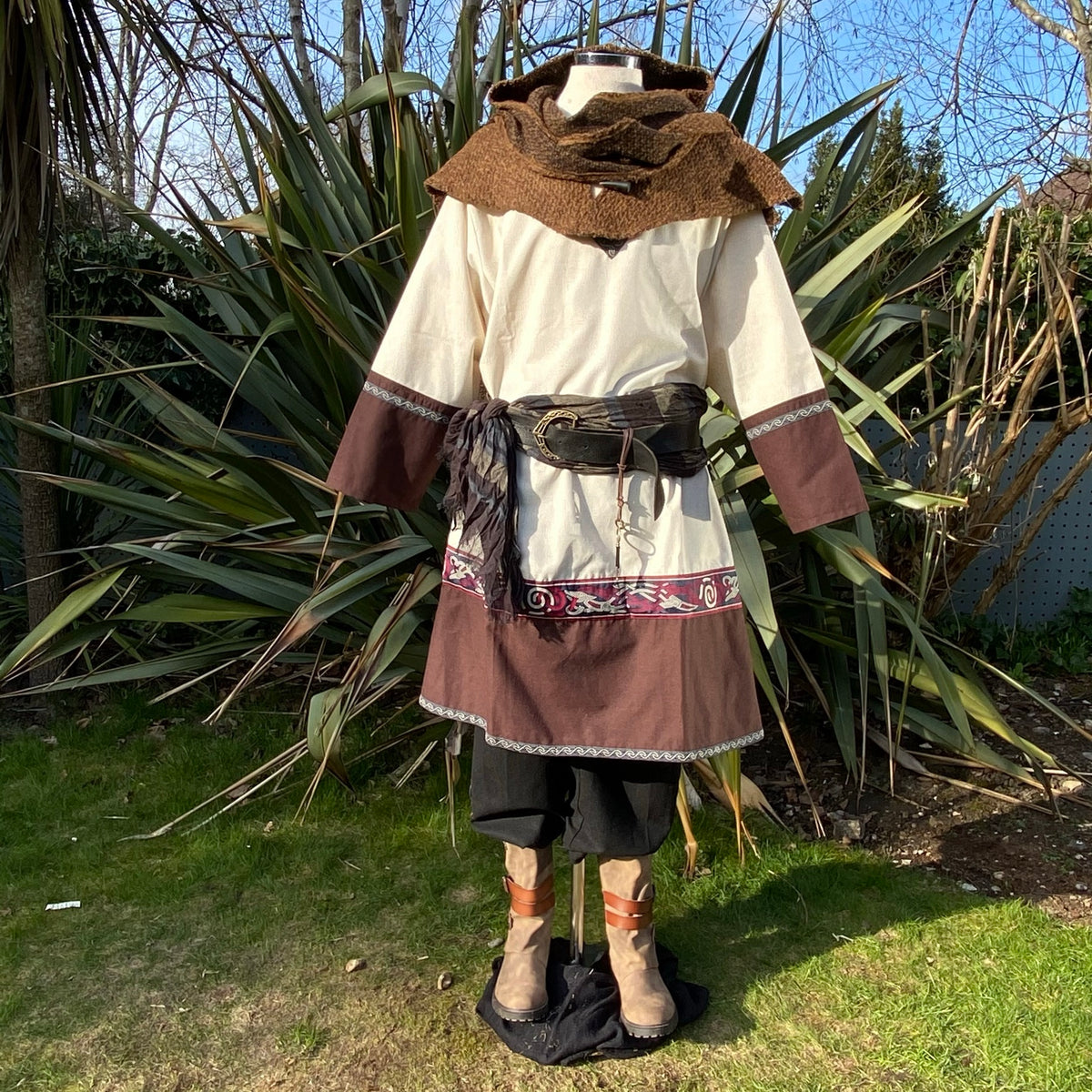 Medieval LARP attire with brown mantle, decorative belt, and boots.