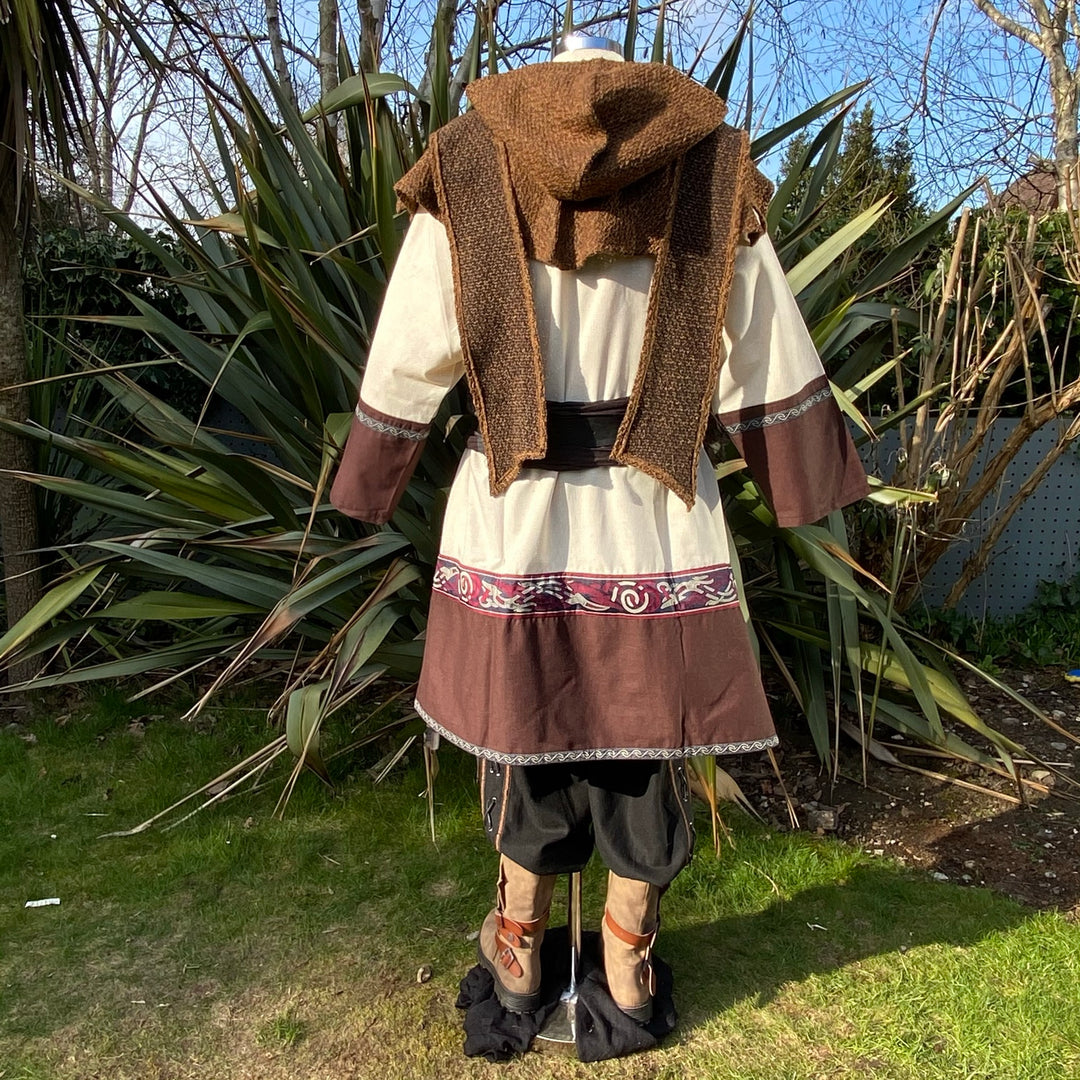 Back view of LARP outfit with embroidered hem, hood draped.