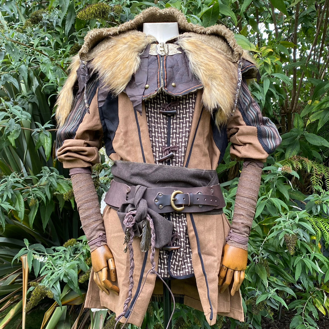 Medieval LARP wrap set with fur collar, detailed sash, and nature backdrop.