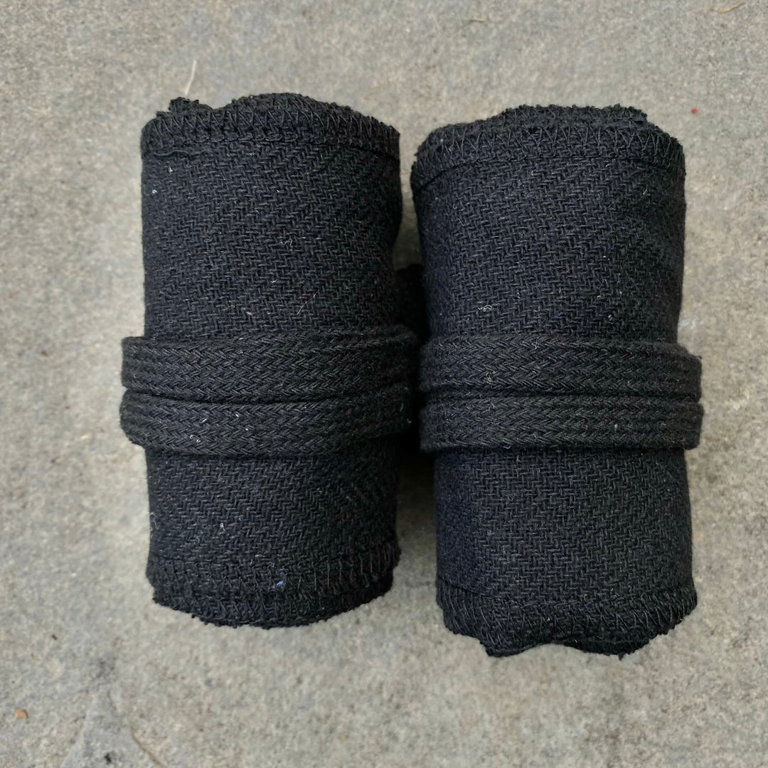 Black herringbone wool leg and arm wraps for LARP or medieval attire.