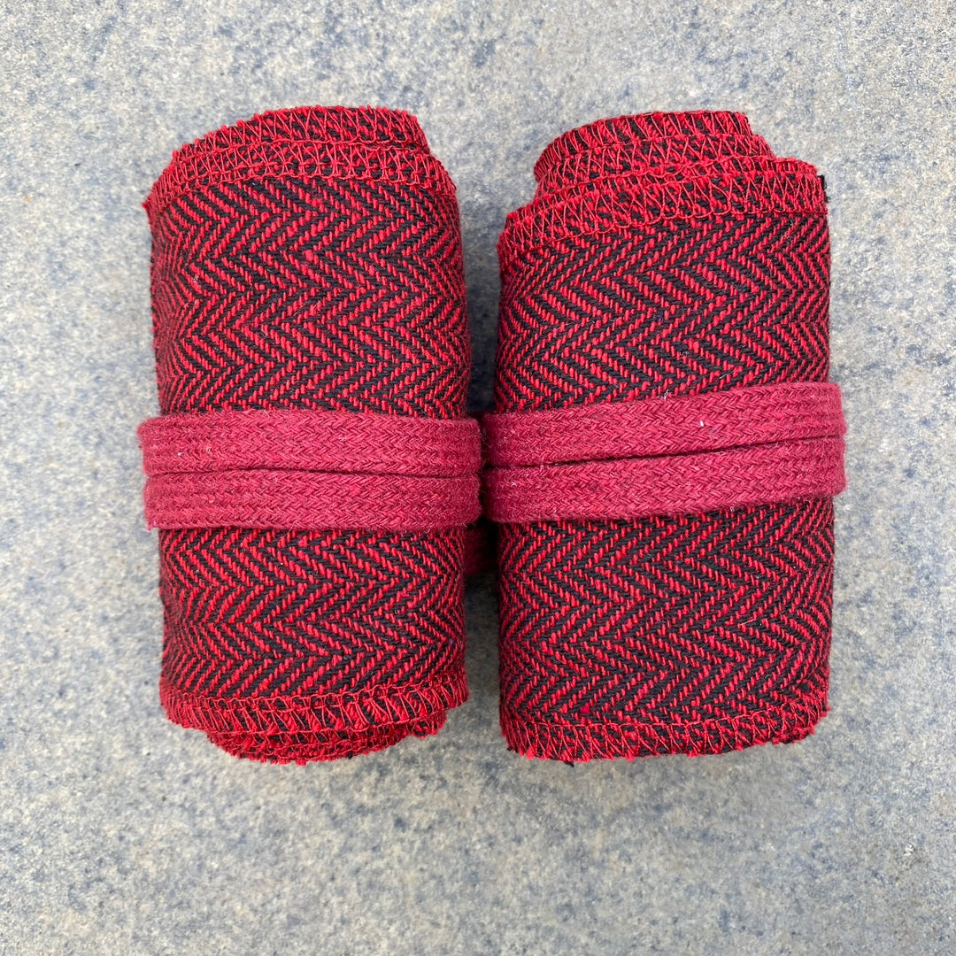 Rolled herringbone wool wraps, red-black, LARP medieval costume detail.