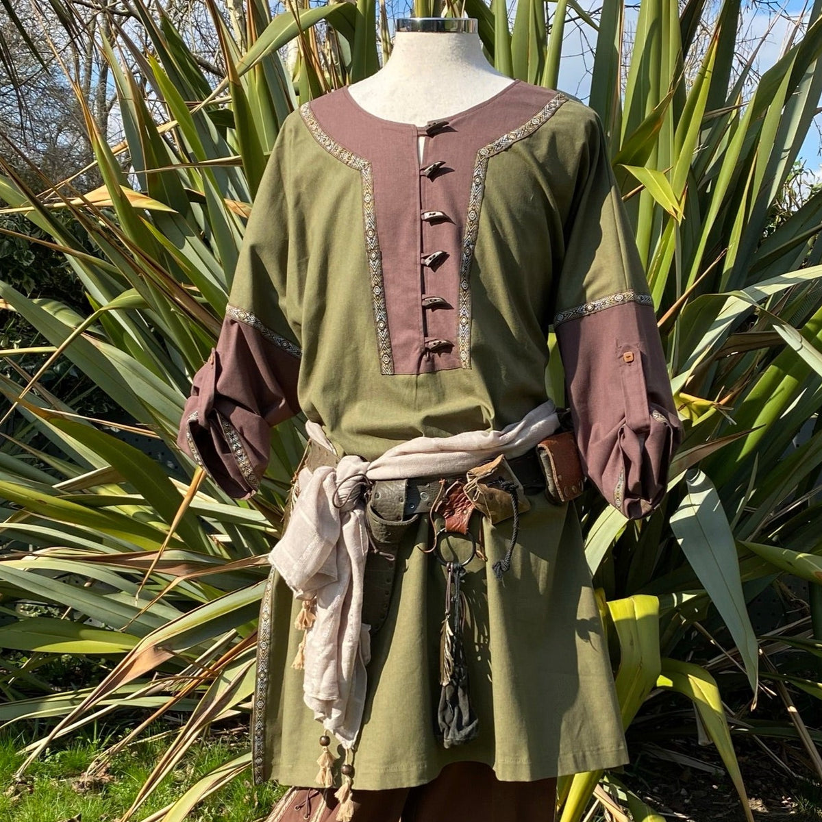 Viking tunic with decorative buttons, green and brown, worn for LARP.