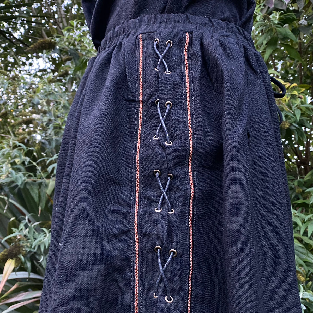 Black medieval trousers with detailed side lacing for LARP.