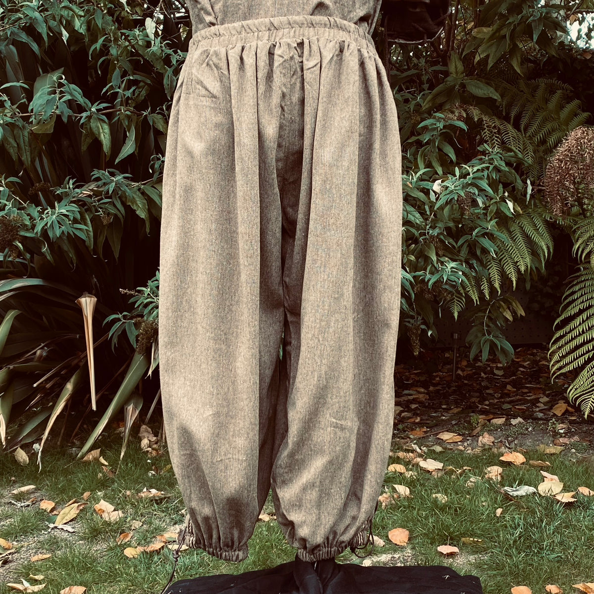 Loose medieval trousers in brown wool, front view, for LARP or renaissance events.