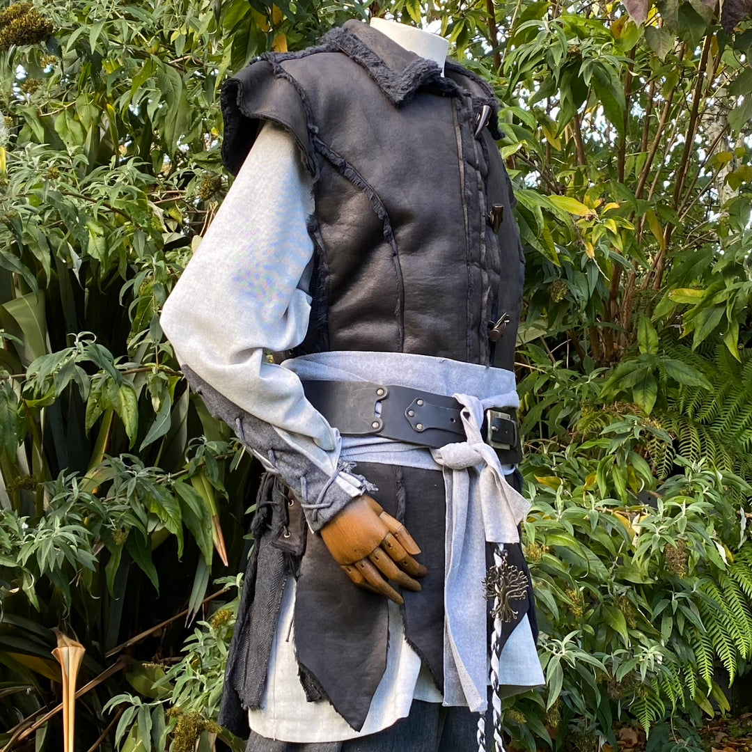 Dark LARP hunter set with black waistcoat, grey shirt, pants, and sash.