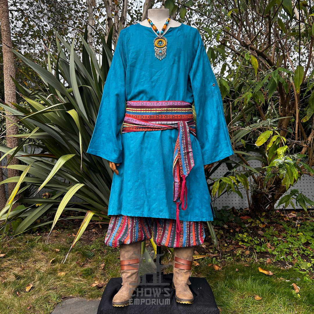 Medieval LARP pedlar set with blue tunic, striped trousers, colorful sash.